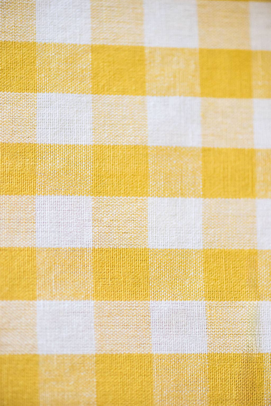 Close-up of yellow and white gingham fabric