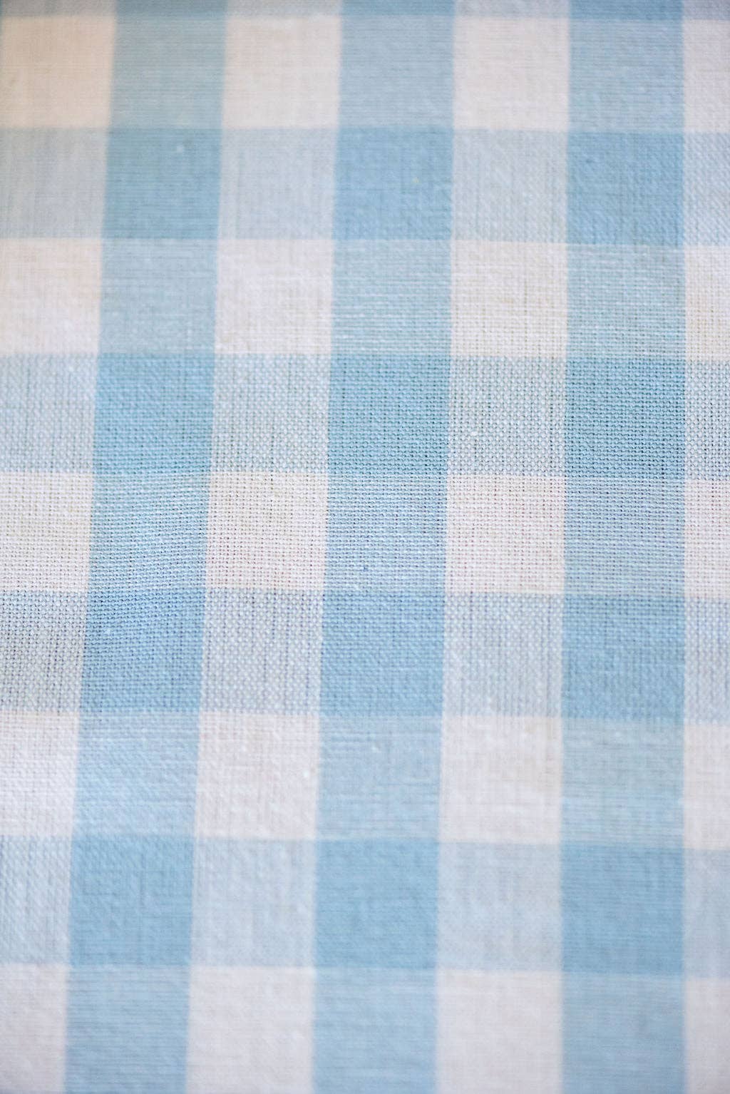 Close-up of blue and white gingham checkered fabric