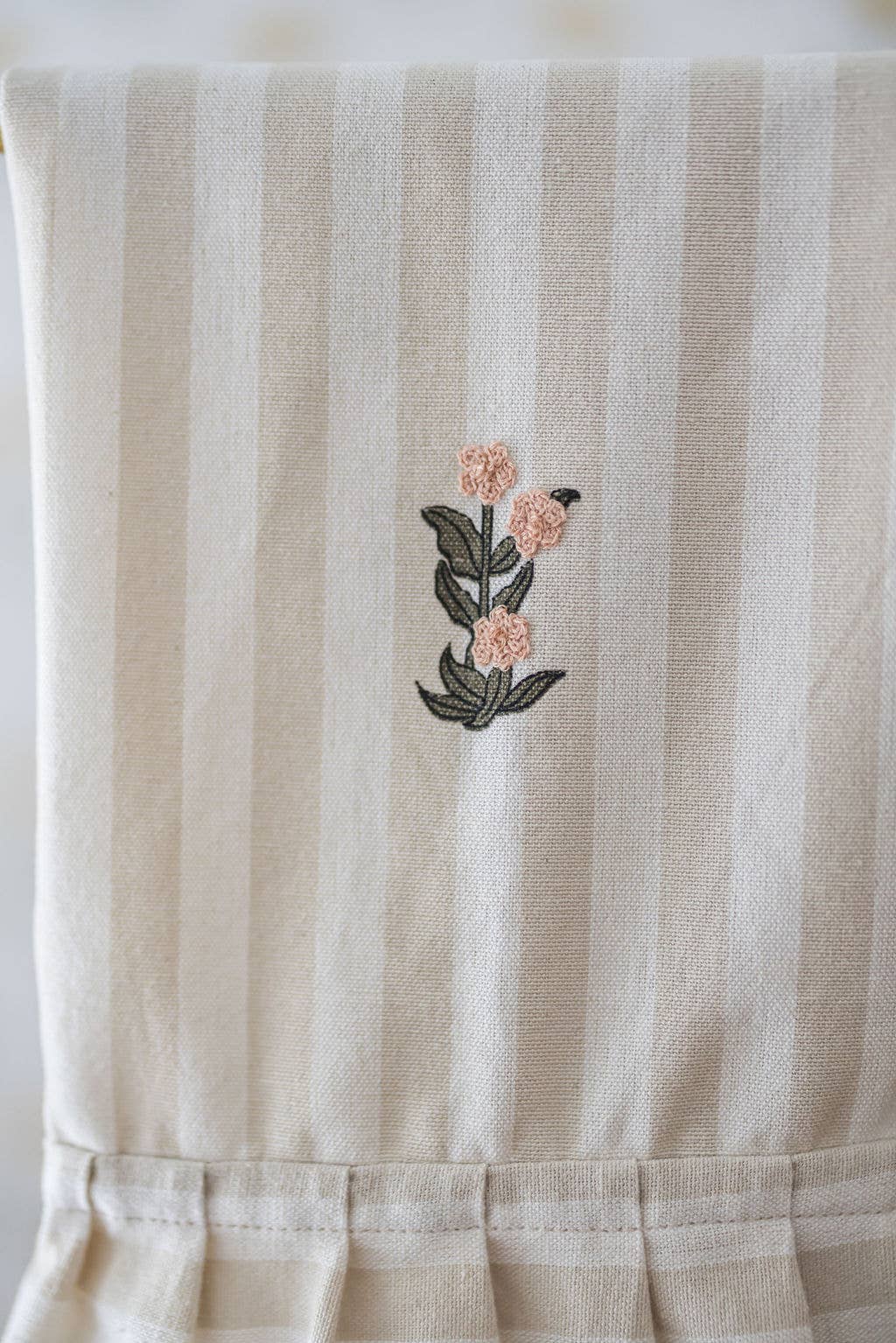 Everyday dish towel with classic stripe and embroidered details