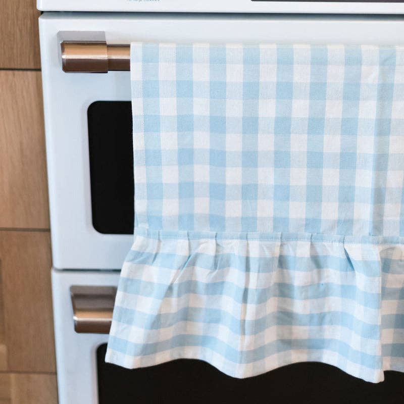 Farmhouse-style blue gingham towel with soft ruffled edge
